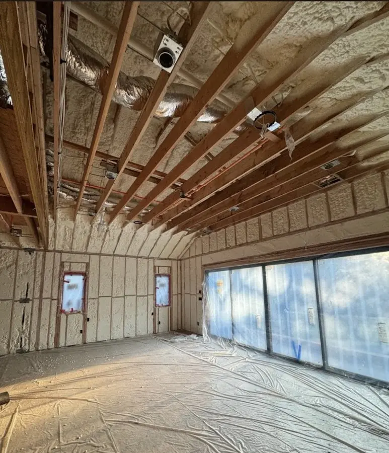 Interior walls and ceiling insulated with spray foam during new construction in Ellwood City